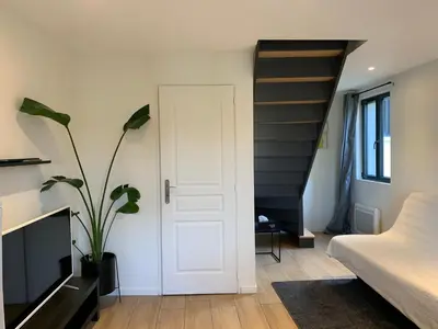Coin salon dans l'établissement Appartement duplex proche zénith, mégacité, stade
