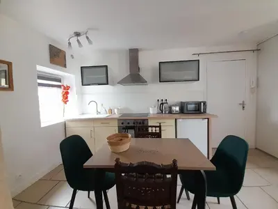 Cuisine ou kitchenette dans l'établissement Côté Château
