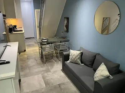 Coin salon dans l'établissement Magnifique duplex central à 2 min de la gare.