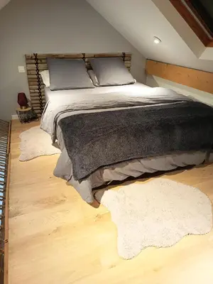 Un ou plusieurs lits dans un hébergement de l'établissement logement Mezzanine salon indépendant
