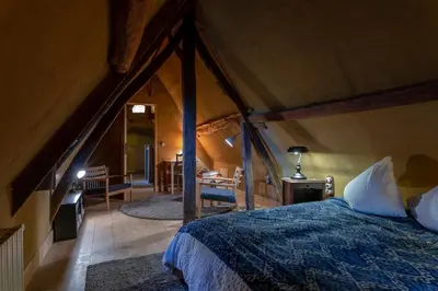 Un ou plusieurs lits dans un hébergement de l'établissement Cottage les forières