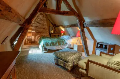 Un ou plusieurs lits dans un hébergement de l'établissement Cottage les forières