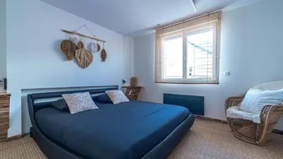 Un ou plusieurs lits dans un hébergement de l'établissement Wood 47 spa
