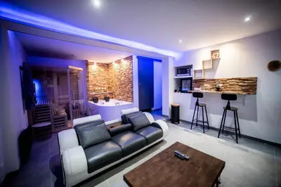 Coin salon dans l'établissement Wood 47 spa