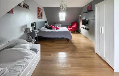 Un ou plusieurs lits dans un hébergement de l'établissement Cozy Home In Bray-Lès-Mareuil