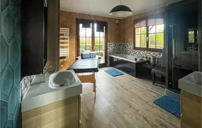 Coin salon dans l'établissement Cozy Home In Bray-Lès-Mareuil