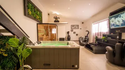 Télévision ou salle de divertissement dans l'établissement Mezza 47 spa
