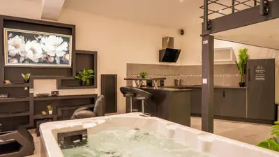 Télévision ou salle de divertissement dans l'établissement Mezza 47 spa