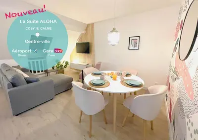 Télévision ou salle de divertissement dans l'établissement La Suite ALOHA, Elegant & Cosy