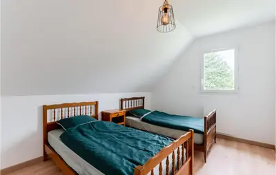 Un ou plusieurs lits dans un hébergement de l'établissement Cozy Home In Lyons-La-Forêt