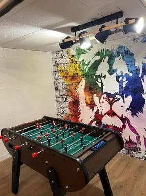 Salle de jeux dans l'établissement Villa avec piscine chauffée à moins 1h30 de Paris