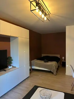 Un ou plusieurs lits dans un hébergement de l'établissement APPARTEMENT 190