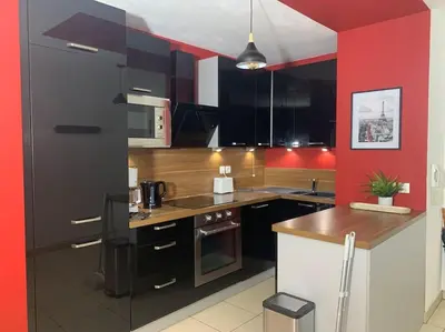 Cuisine ou kitchenette dans l'établissement Ermont paris