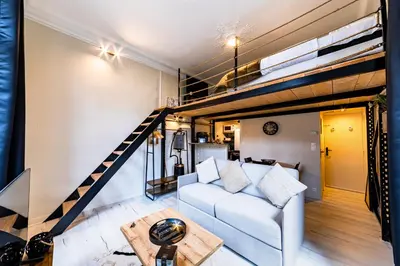 Coin salon dans l'établissement Le Château Senard, Studio cosy 23 m2 au calme proche gare - 3 min