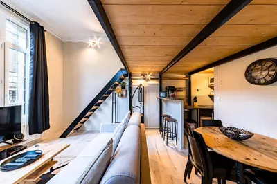 Coin salon dans l'établissement Le Château Senard, Studio cosy 23 m2 au calme proche gare - 3 min