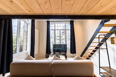 Télévision ou salle de divertissement dans l'établissement Le Château Senard, Studio cosy 23 m2 au calme proche gare - 3 min