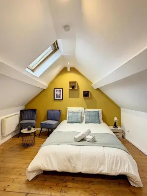 Un ou plusieurs lits dans un hébergement de l'établissement Magnifique studio centre ville Saint Leu 2 pers