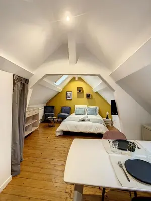 Un ou plusieurs lits dans un hébergement de l'établissement Magnifique studio centre ville Saint Leu 2 pers
