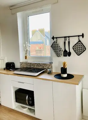 Cuisine ou kitchenette dans l'établissement La Belle Vue Appartement 2 personnes Vue port