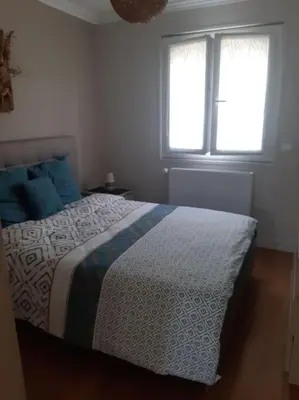 Un ou plusieurs lits dans un hébergement de l'établissement Maison Aubergenville Elisabethville