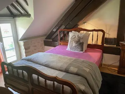 Un ou plusieurs lits dans un hébergement de l'établissement Appartement Héritage - 1 chambre 4 personnes