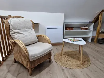Coin salon dans l'établissement Gîte Au bord du Halage