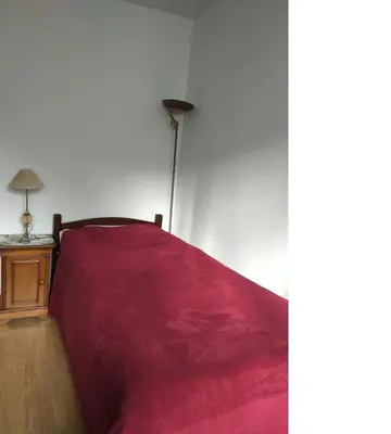 Un ou plusieurs lits dans un hébergement de l'établissement Chambre 5 minutes de la gare à pieds