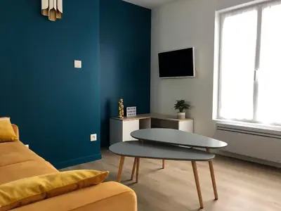 Télévision ou salle de divertissement dans l'établissement Maison Gabriel Appartement BULLE
