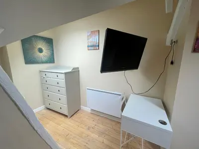 Télévision ou salle de divertissement dans l'établissement Maison hyper centre avec parking 7 mn à pied de la gare de Rouen