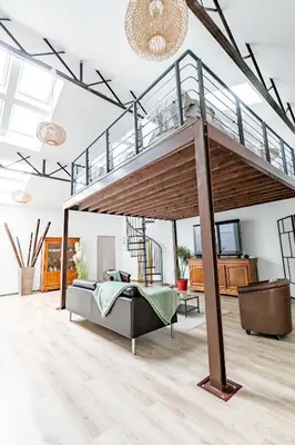Coin salon dans l'établissement Loft & Spa LE FAUBOURG SAINT MARTIN