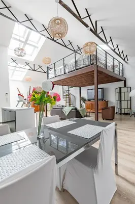 Coin salon dans l'établissement Loft & Spa LE FAUBOURG SAINT MARTIN