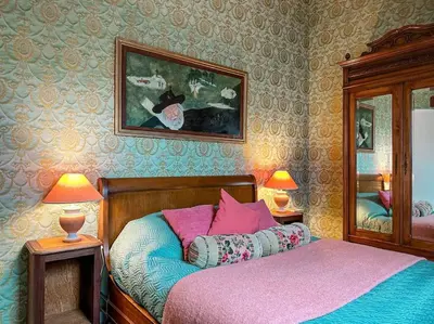 Un ou plusieurs lits dans un hébergement de l'établissement La Souveraine - Cottage - Château Le Bas Bleu