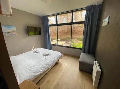 Un ou plusieurs lits dans un hébergement de l'établissement Parc Beausejour Aparthotel
