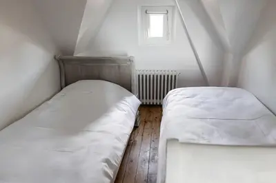 Un ou plusieurs lits dans un hébergement de l'établissement La Villa de l'Etoile 10 personnes