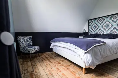 Un ou plusieurs lits dans un hébergement de l'établissement La Villa de l'Etoile 10 personnes