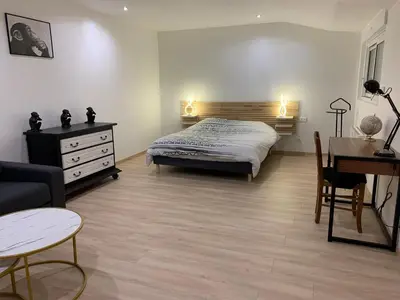 Un ou plusieurs lits dans un hébergement de l'établissement Gîte, Maison entière avec billard et bel espace de vie La Grange