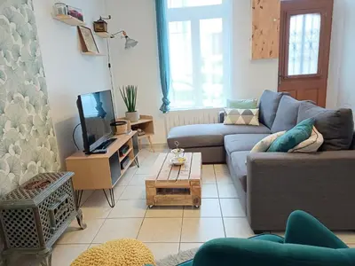 Coin salon dans l'établissement L'artistique, Maison pour 5 personnes, 2 chambres, stationnement gratuit, spacieux, atypique