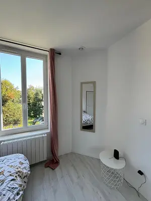 Un ou plusieurs lits dans un hébergement de l'établissement Pink Cosy