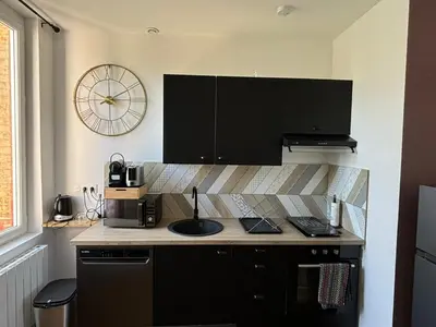 Cuisine ou kitchenette dans l'établissement Pink Cosy