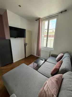 Télévision ou salle de divertissement dans l'établissement Pink Cosy