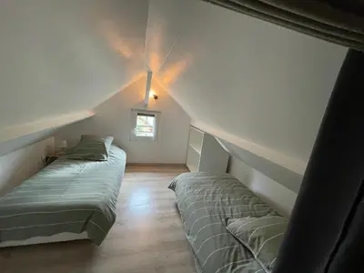 Un ou plusieurs lits dans un hébergement de l'établissement Cosy Giverny