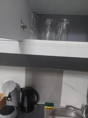 Cuisine ou kitchenette dans l'établissement Maison annexe une chambre proche Paris
