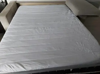Un ou plusieurs lits dans un hébergement de l'établissement Maison annexe une chambre proche Paris