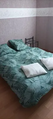 Un ou plusieurs lits dans un hébergement de l'établissement La villa des DEF'S