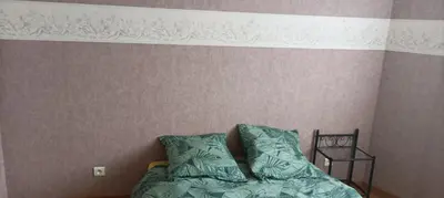 Un ou plusieurs lits dans un hébergement de l'établissement La villa des DEF'S