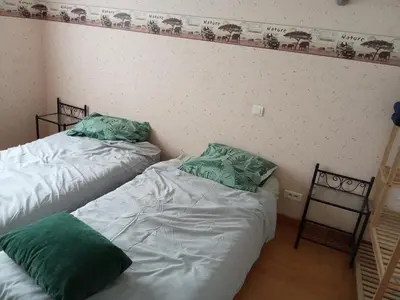 Un ou plusieurs lits dans un hébergement de l'établissement La villa des DEF'S