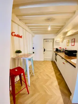 Cuisine ou kitchenette dans l'établissement Le Pop