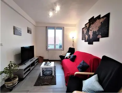 Télévision ou salle de divertissement dans l'établissement LE PHARE