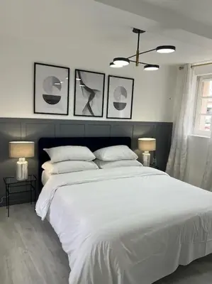 Un ou plusieurs lits dans un hébergement de l'établissement Beau duplex au centre Ville.