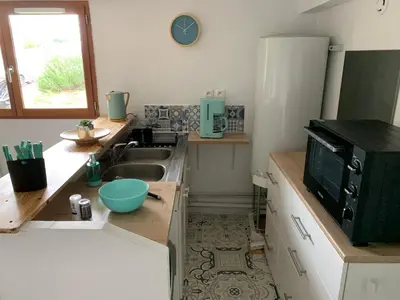 Cuisine ou kitchenette dans l'établissement Logement à 20 min de Paris avec parking gratuit